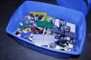 A blue Lego chest with various Lego and figures