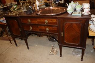 A mahogany break front sideboard fitted two centra