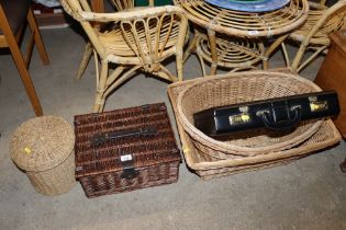 A quantity of wicker baskets and a briefcase