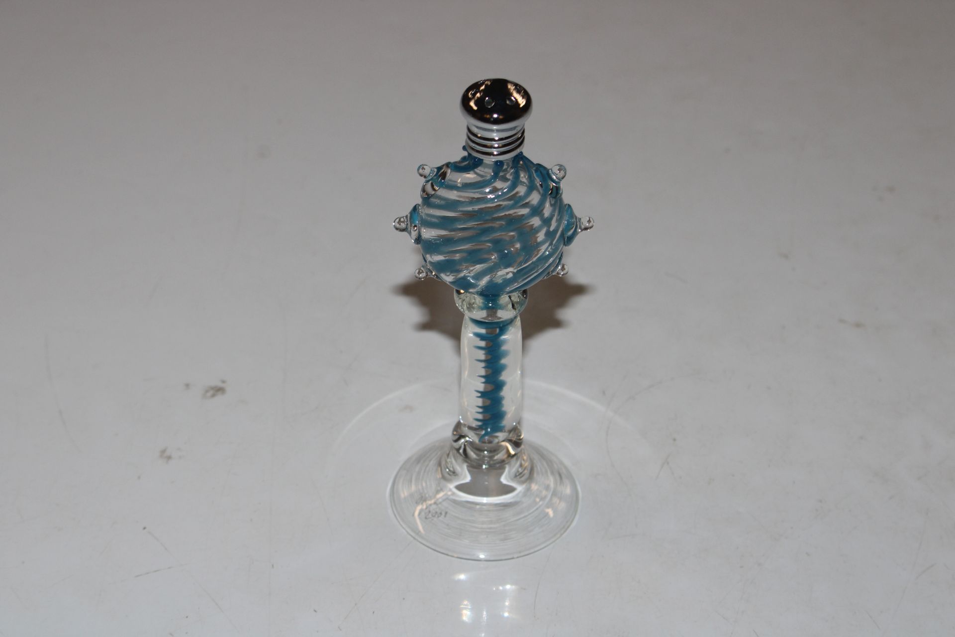 An Art Glass pepperette signed and dated to base 2