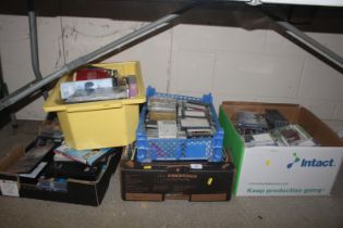 Five boxes containing CD's, cassette tapes, DVD's