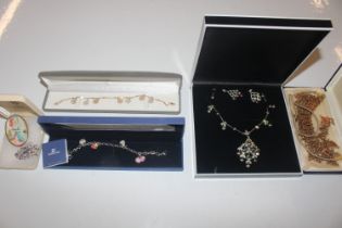 A Swarovski charm bracelet and other jewellery