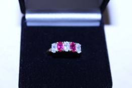 A silver gilt cubic zirconia ruby coloured stone s