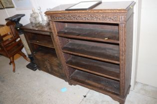 An oak open fronted four tier bookcase