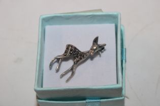 A vintage silver and marcasite fawn brooch