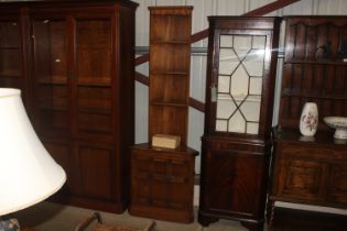 An Ercol corner cupboard