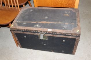 A metal bound storage trunk