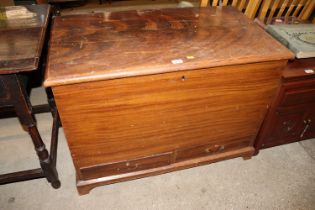 A pine storage box fitted two drawers and candle b