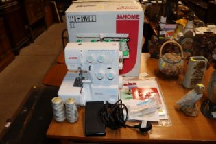 A Janome over locker sewing machine 8002DG with or