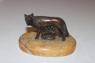 A model of Romulus and Remus on raised faux marble