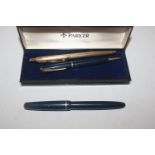 A Parker fountain pen with 14ct gold nib and two b