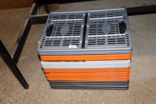 Eight collapsible storage crates