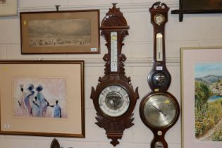 A Victorian oak cased banjo barometer