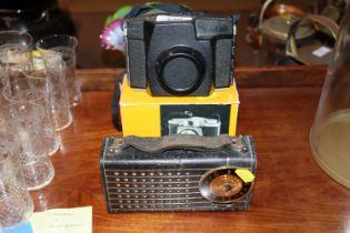 A vintage Pye radio and a Kodak camera