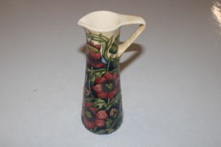 A Moorcroft pottery vase with tube lined decoratio