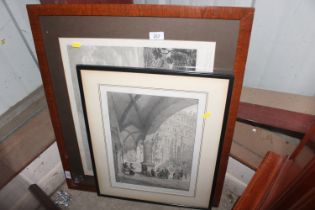 A framed and glazed black and white print depictin