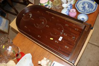 A House of Marbles bagatelle board with original b