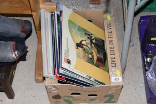 A box of various records