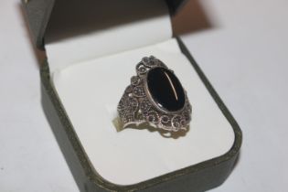 A 925 silver marcasite and onyx set ring