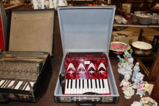 A piano accordion with carry case