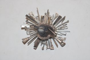 An H.M.T. Sterling silver modernist brooch with Dr