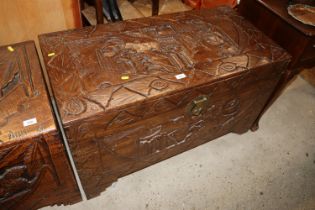 A carved camphorwood storage chest