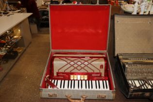 A Hona Virtuola 3 piano accordion in fitted case