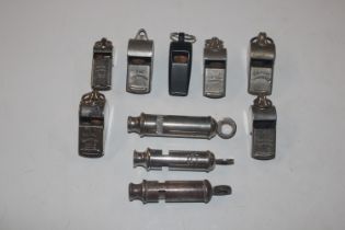A collection of whistles including military, polic