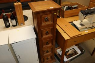 A pine nest of five drawers