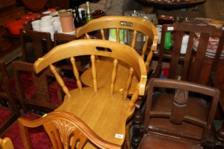 A pair of high seat kitchen chairs