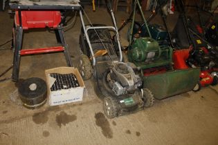 A Gardenline petrol rotatory lawn mower