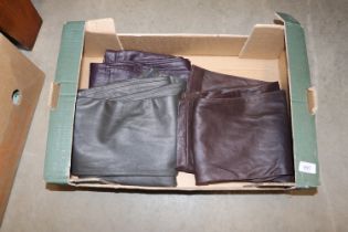 Three pairs of leather trousers