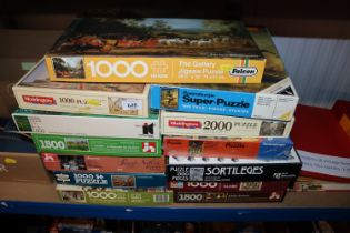 A collection of various jigsaw puzzles