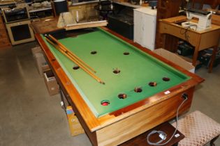 A vintage bar billiard table