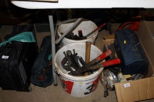 Two plastic tubs containing various hand tools