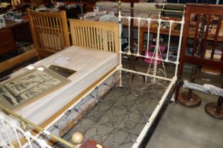 An Edwardian brass and iron single bedstead