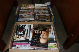 Two boxes of DVDs