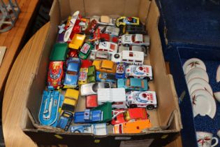 A box of miscellaneous die-cast vehicles