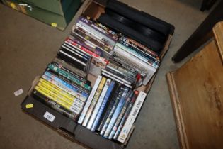 A box of miscellaneous DVD's