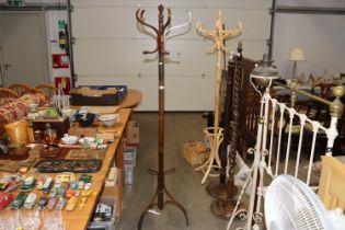 A mahogany hat and coat stand