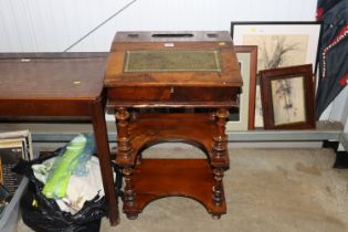 A Victorian walnut Davenport writing desk