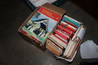 A box of various road and Ordnance Survey maps and