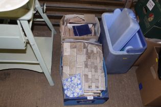 Two boxes of tiles