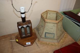 A vintage wooden lamp made from a pulley; and a sh