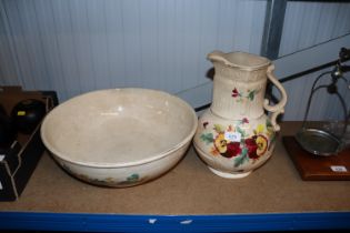 A Victorian floral decorated toilet jug and bowl