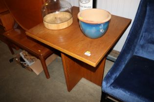 A teak effect square occasional table