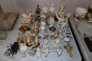 A collection of miscellaneous porcelain figures