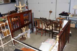 An Edwardian inlaid mahogany bedstead