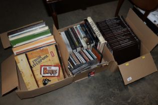 Three boxes containing various LPs, books, CDs etc