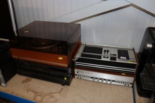 A Tandberg TCD310 cassette player, amplifier and a dual turntable together with a Technics compact